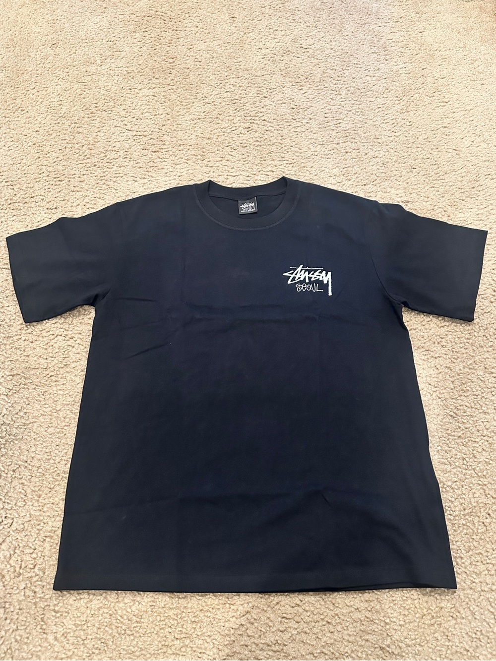 Stussy Seoul Chapter Black Short Sleeve Tee with White Script Logo